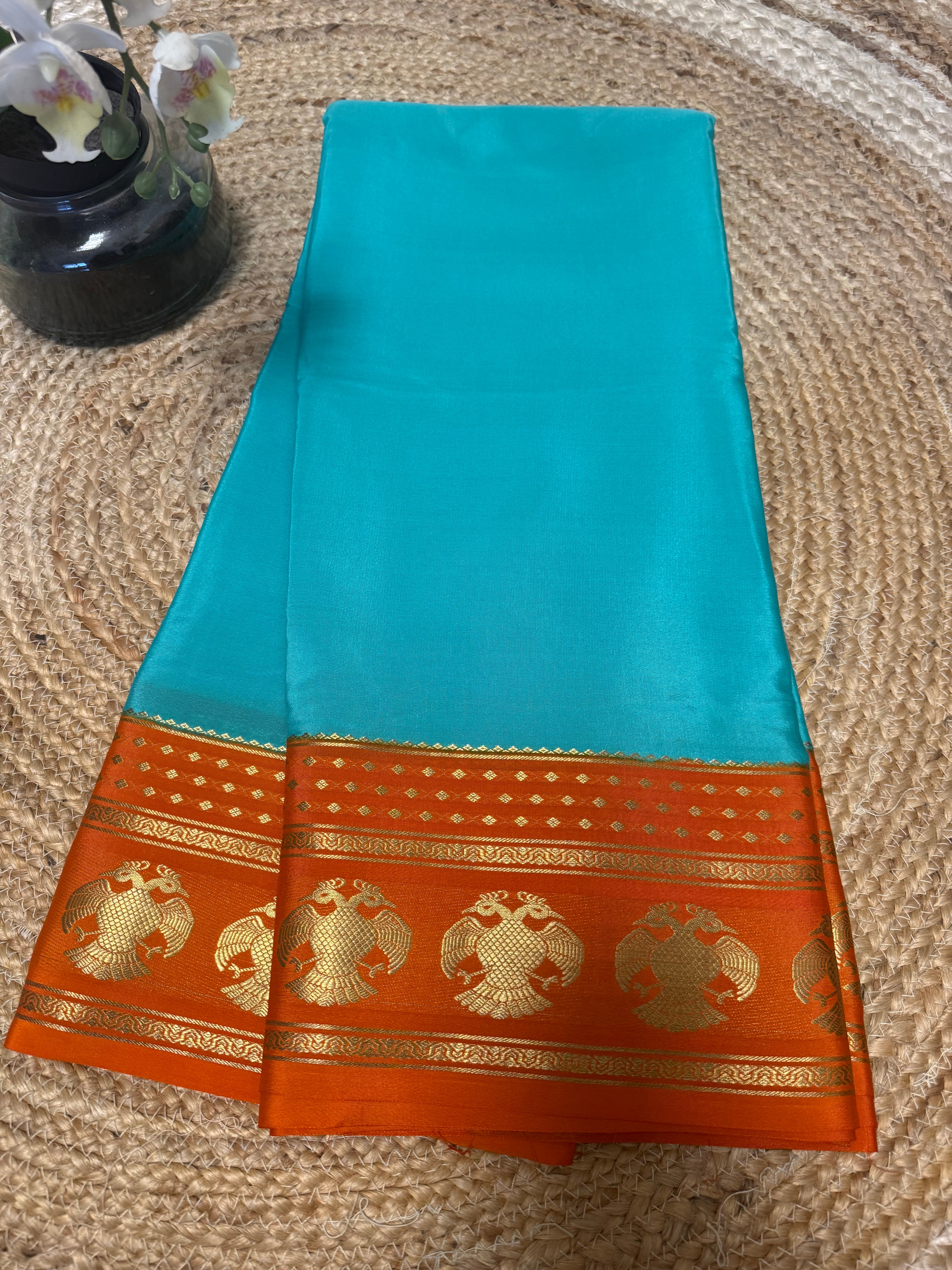 Blue nd orange Pure Mysore silk saree with Gandaberunda border